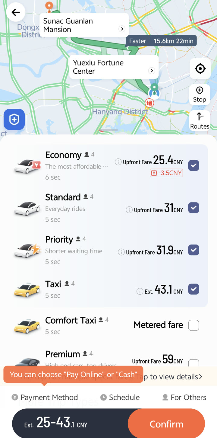 DiDi ride options comparison screen showing real-time fares for Economy, Standard, and Taxi tiers